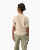 Back view of NatanyaPW wool pullover in neutral tone