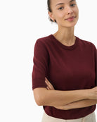 Close-up of ribbed neckline and fine wool texture