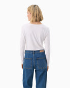 Back view showing stretch and texture of material in long sleeve tee