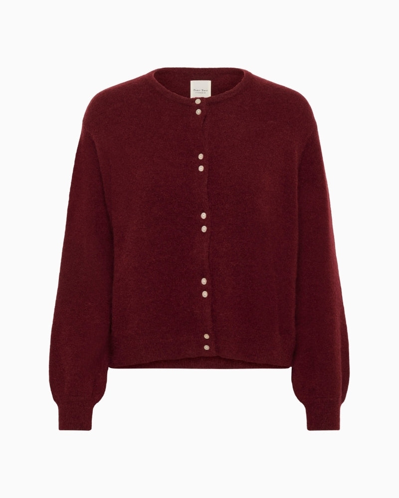 Front view of burgundy cardigan with mother-of-pearl buttons