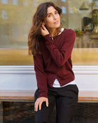 Part Two cardigan laid flat showing neckline, button closure, and soft wool texture