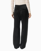 Back view of classic fit black trousers with structured shape