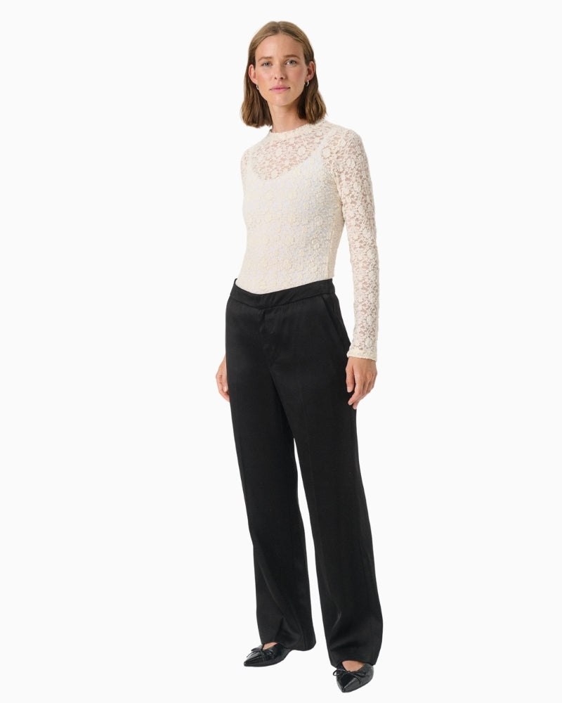 Model profile of lightweight tailored trousers in soft drape
