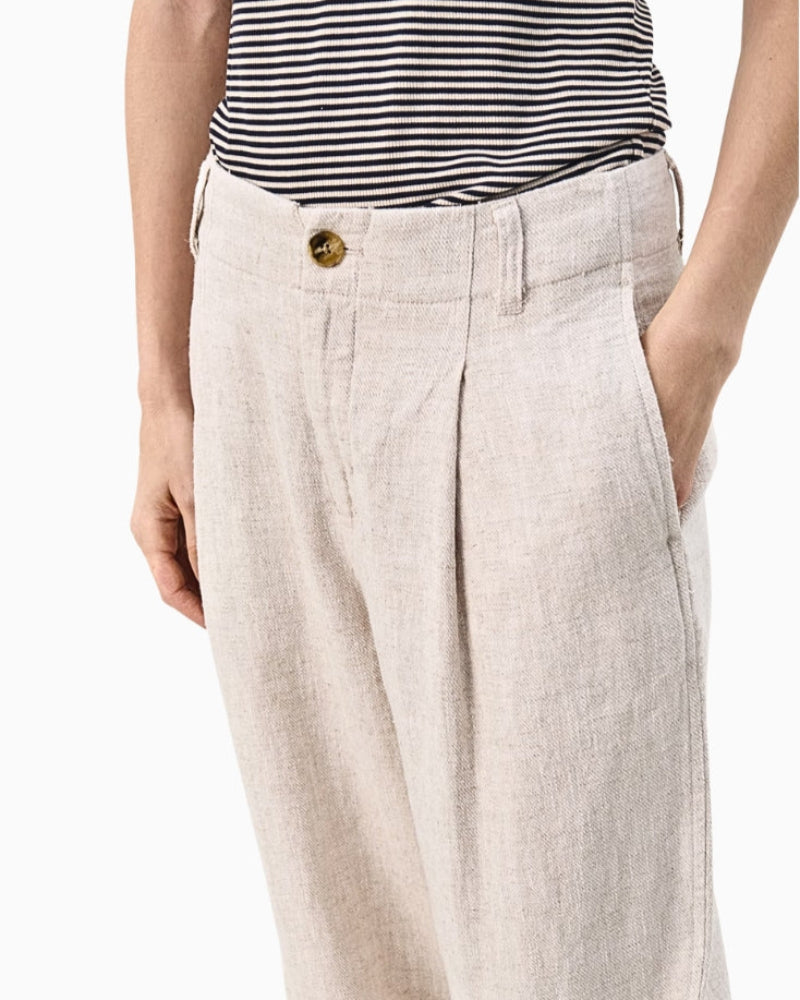 Side view of Part Two Netta trousers styled for a casual summer look