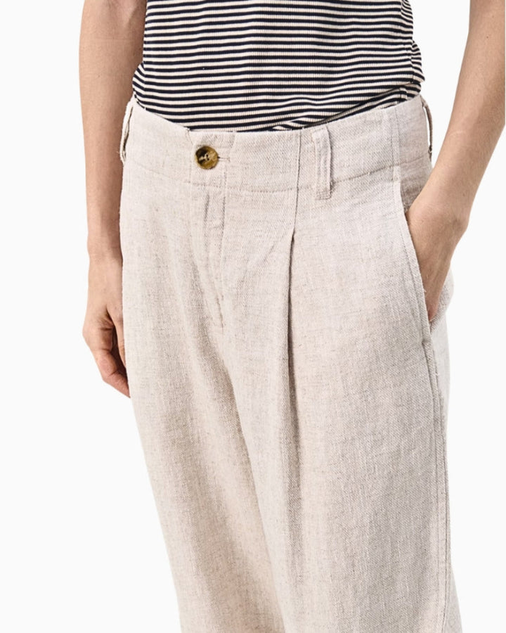 Side view of Part Two Netta trousers styled for a casual summer look