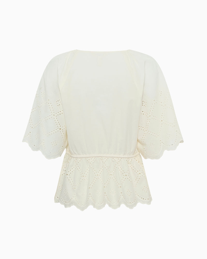 Flat lay back view of Part Two Rosalie Blouse showing woven texture and flowing silhouette