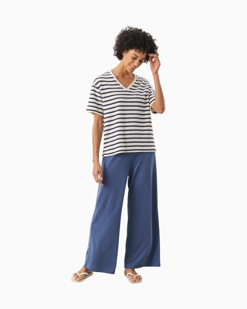 Full length view of model wearing blue and cream Part Two T-shirt with casual