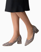 Pair of pumps styled with tailored trousers for smart look