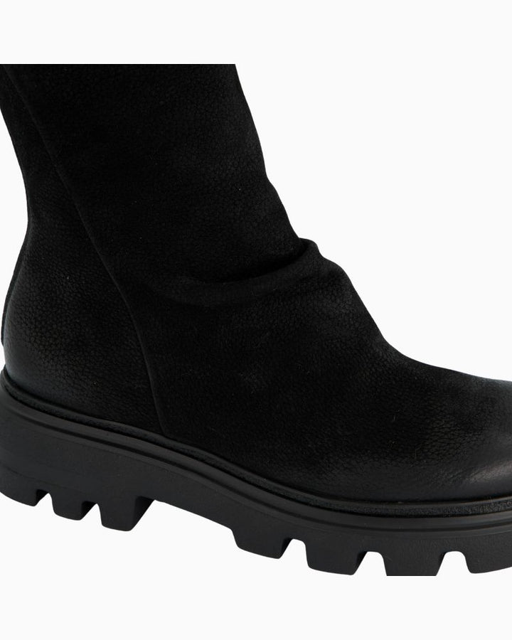 Close-up of nubuck leather upper with fine pleating and smooth toe finish