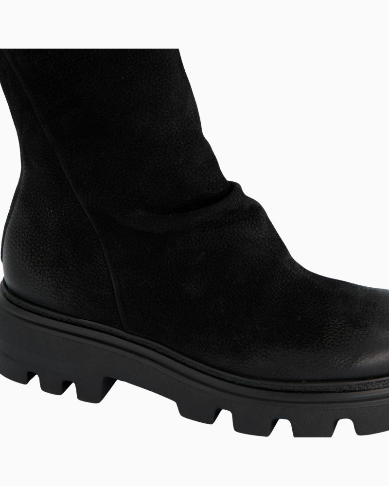Close-up of nubuck leather upper with fine pleating and smooth toe finish
