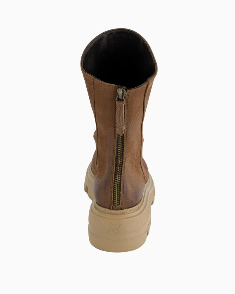 Back view showing soft leather texture and low 15 mm heel