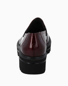 Back view showing reinforced heel and padded shaft edge on slip-on shoe
