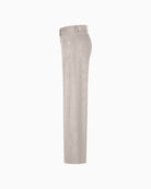 Side view of soft ribbed corduroy trousers with patch pockets