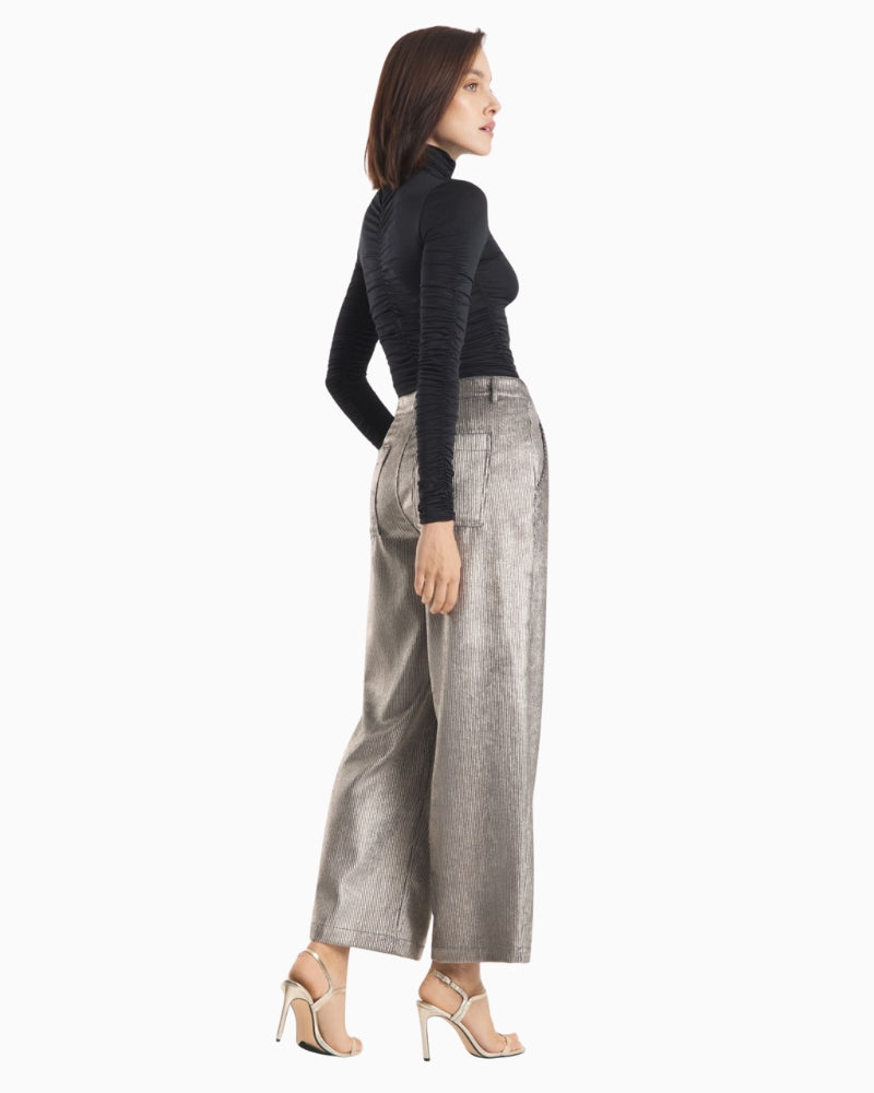 Side view highlighting chino style waistband and cropped length