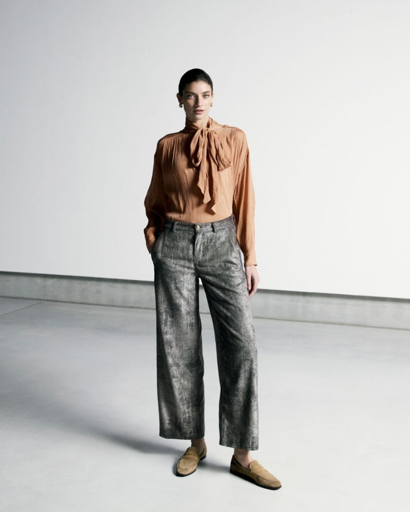 Model wearing Yuki cords with fine knit and ankle boots