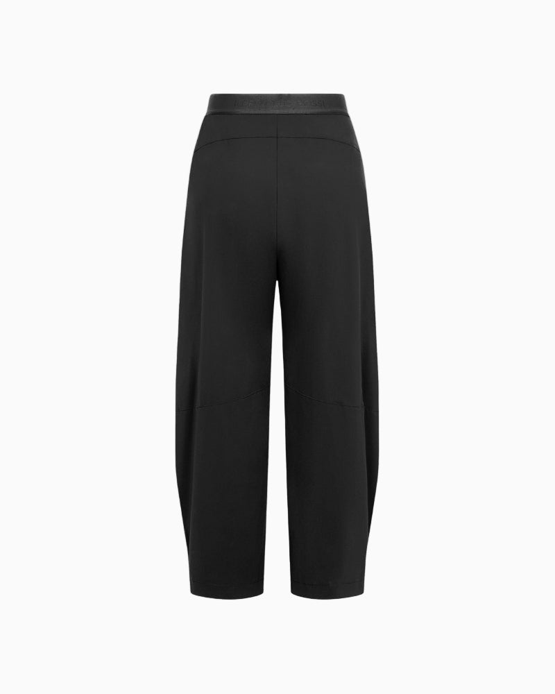 Back view showing elasticated waistband and relaxed fit of Hale trousers