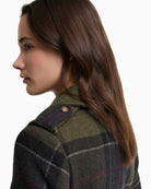 Rear view of Barbour Cottemore navy checked coat