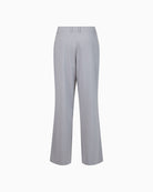 Back view of Cloe trousers with faux pockets and clean finish