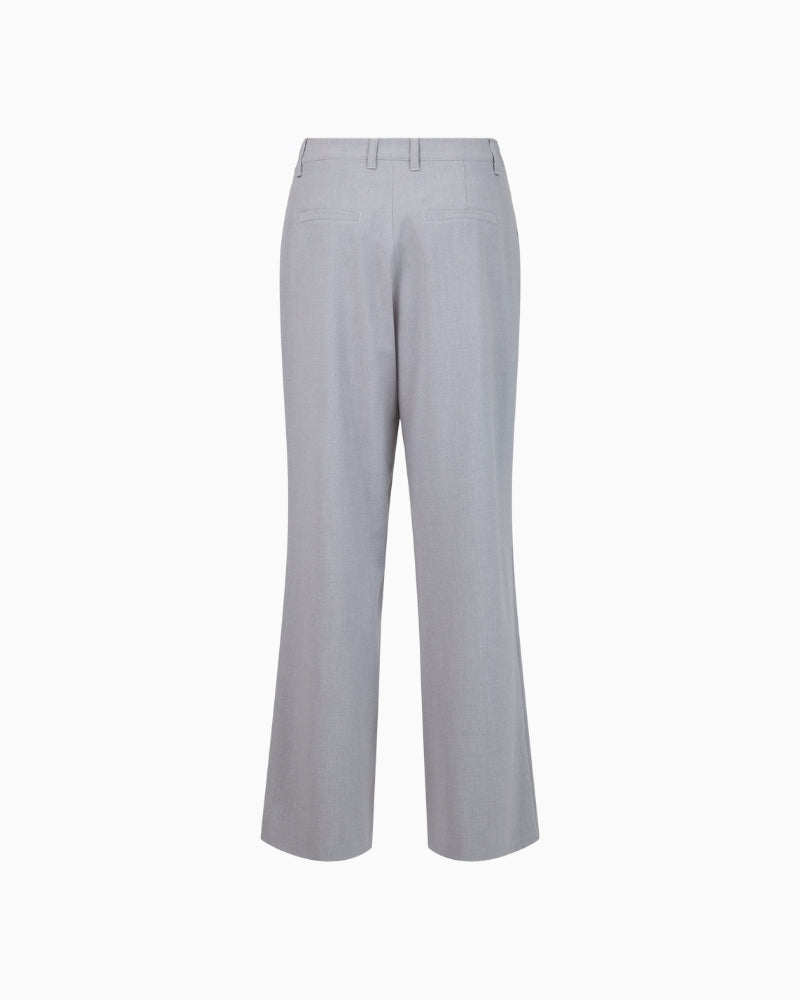 Back view of Cloe trousers with faux pockets and clean finish