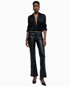 Front view of medium-rise jeans with zip and button fastening