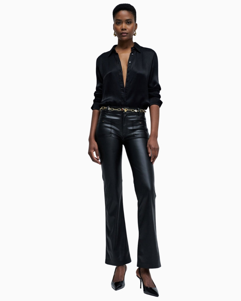 Front view of medium-rise jeans with zip and button fastening