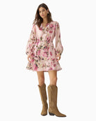 Woman wearing Salsa floral dress pink – Áines Boutique