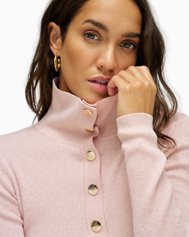 Close-up of Salsa pink polo knit gold button neckline detail – Áines Boutique