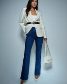Front view of Salsa blue bootcut jeans with side zip and faux pockets