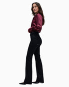 Side view of Secret Silhouette jeans showing push in shaping effect