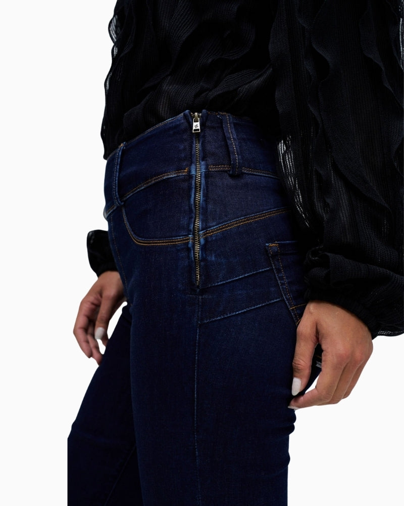 Close-up of waistband and zip fastening detail on Salsa Push In jeans