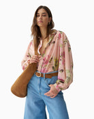 Side profile showing sleeve volume on Salsa pink shirt – Áines Boutique