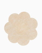 Close-up of lightweight satin stick-on nipple covers for discreet wear