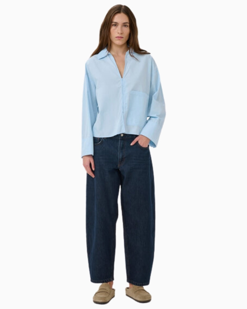 Sunna boxy shirt blue outfit view with dark trousers