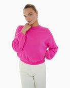 TWNS The Label Colorado Puff Sleeve Jumper in Neon Pink front view