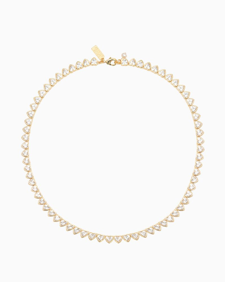 Gold plated hearts tennis necklace shown with linen drawstring pouch