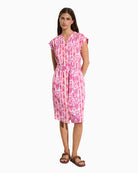Woman wearing Tina Leya shirt dress in fuchsia, front view – Áines Boutique