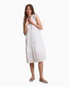 Woman wearing Tina Madrono white dress front view – Áines Boutique