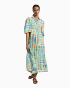 Woman wearing Tina Milta shirt dress in lime, front view – Áines Boutique