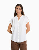 Tinta Anika off-white short sleeve blouse, front view on model – Áines Boutique