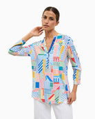 Tinta Merve blue blouse, front view on model – Áines Boutique