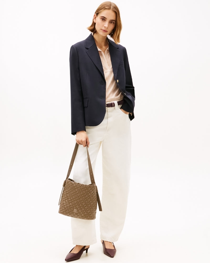 Tommy Hilfiger shoulder bag styled with jeans and a blazer