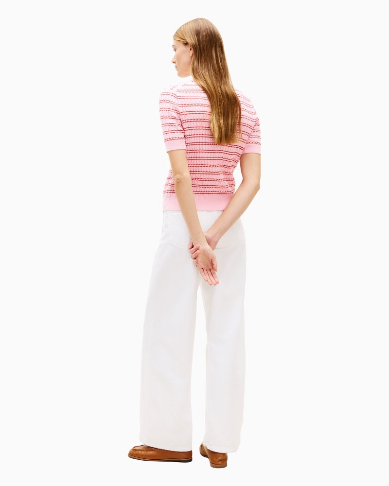 Back of Tommy Hilfiger knit top styled with white trousers – Áines Boutique