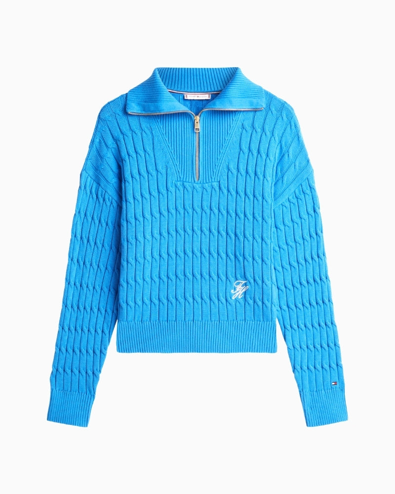 Front view of Tommy Hilfiger cable knit half-zip sweater in cream