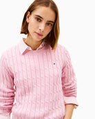 Close-up of cable knit texture and soft cotton yarn