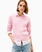 Front view of Tommy Hilfiger baby pink cable knit jumper