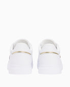 White Tommy Hilfiger leather trainer sole view – Áines Boutique