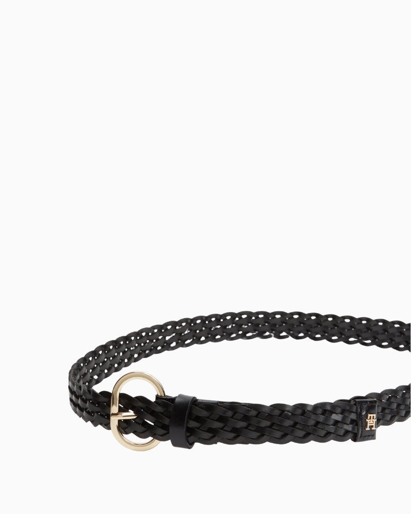 Detail of Tommy Hilfiger branding on slim black belt