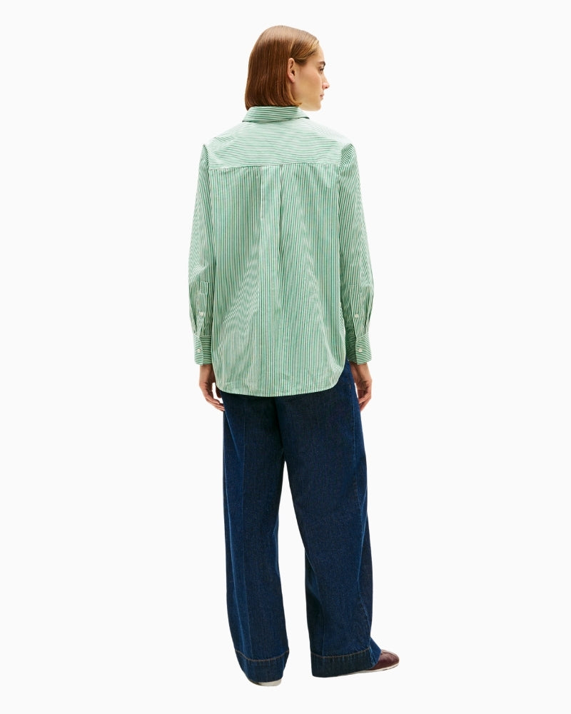 Back view of shirt with curved hem and cuff detail