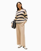 Wide leg ankle pants by Tommy Hilfiger styled with white trainers