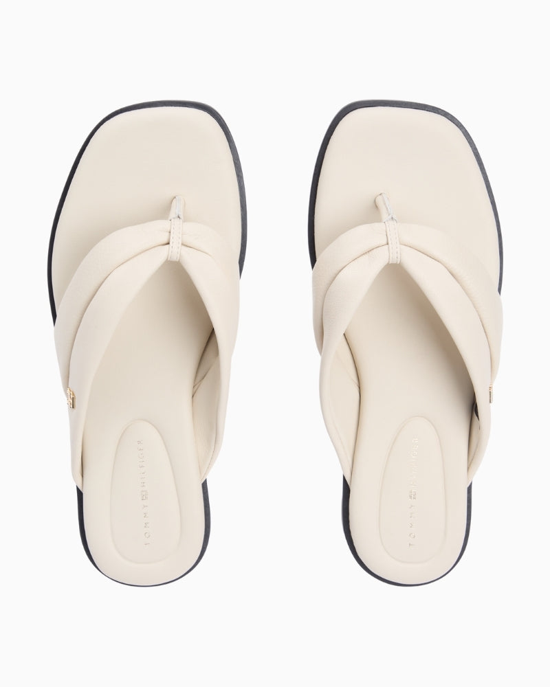 Cream Tommy Hilfiger flat leather sandal top view showing logo detail – Áines Boutique